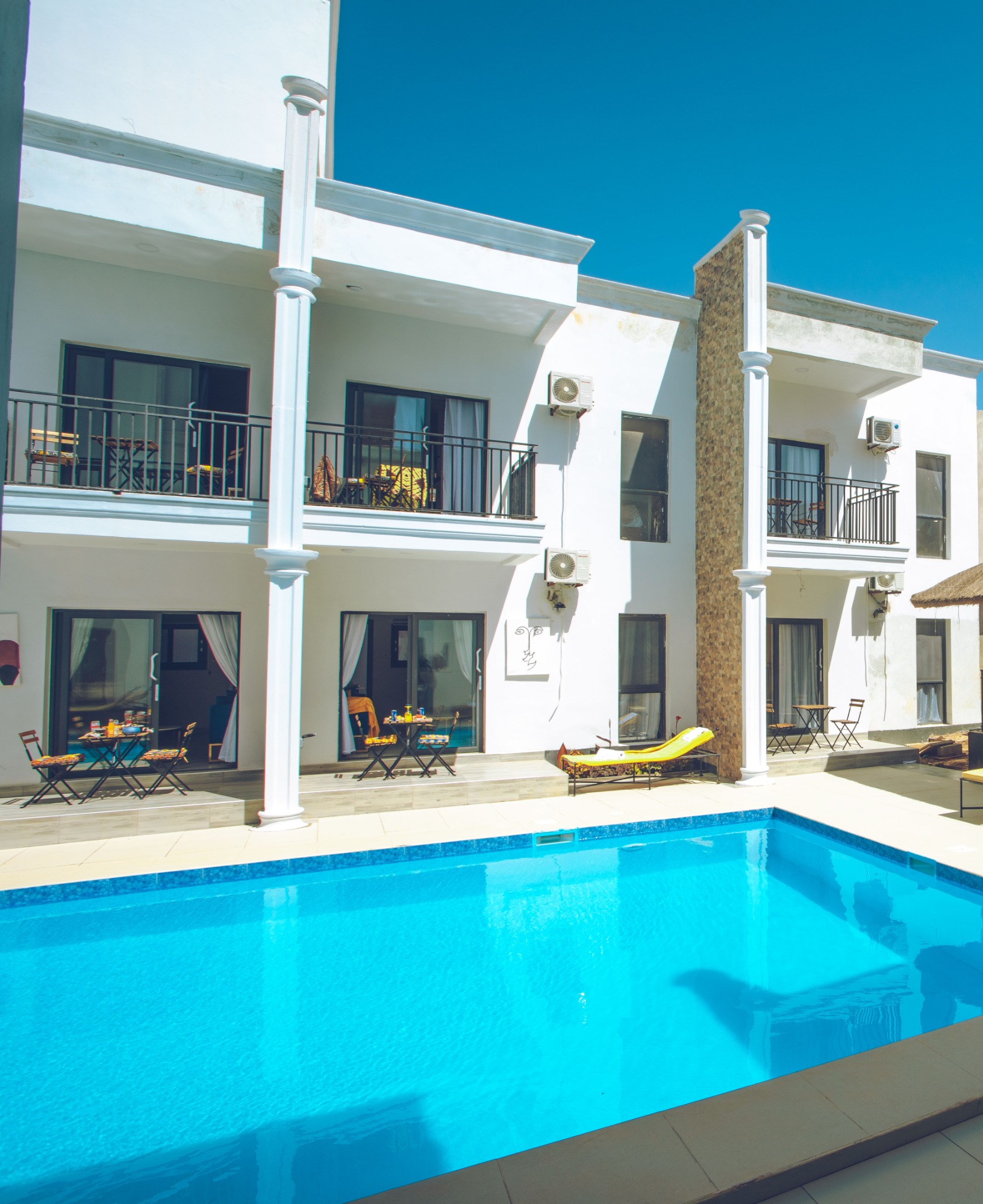 MICA Apartments pool and facade detail