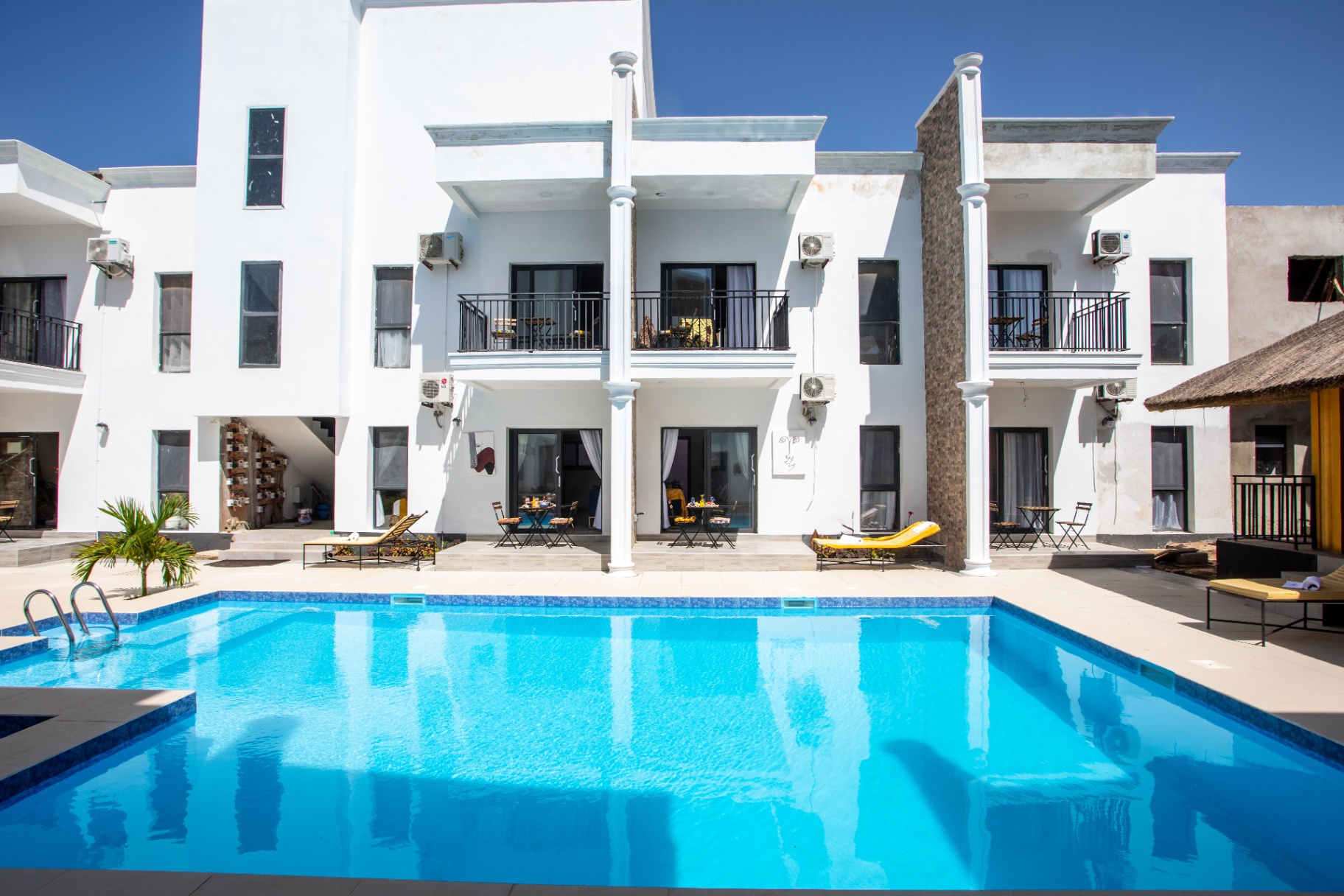 MICA Apartments pool courtyard with apartment facades
